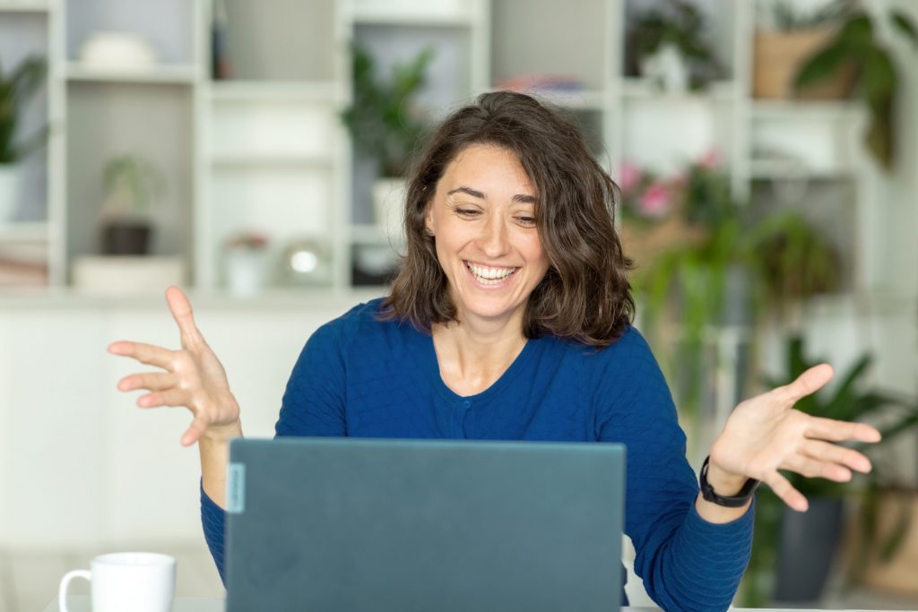 woman answering behavioral interview questions online