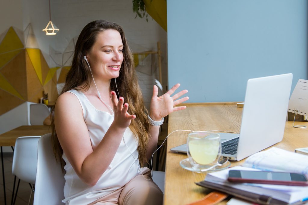 woman participating in behavior-based interview through videoconferencing